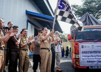 Pj Bupati Ciamis Resmi Lepas Penyaluran Beras Pemerintah Sebagai Bantuan Pangan Tahun 2024, Kepada Masyarakat Miskin